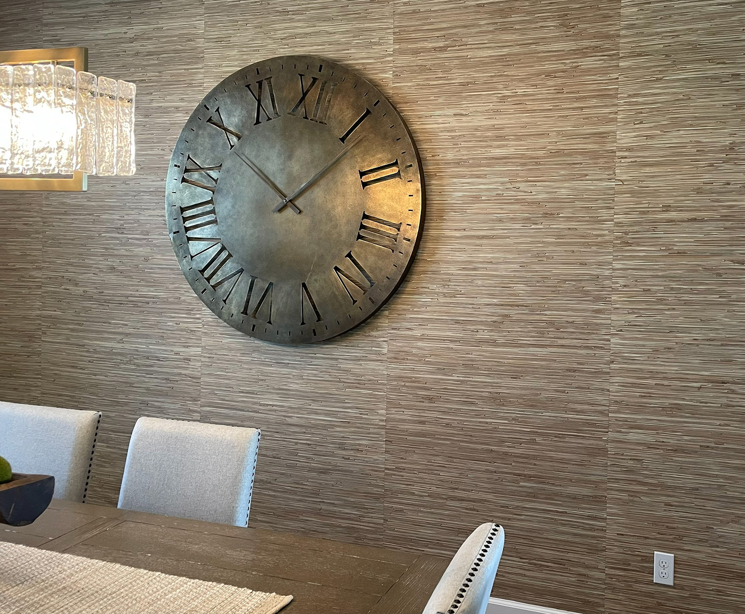 Full wall showing natural grasscloth panel variation